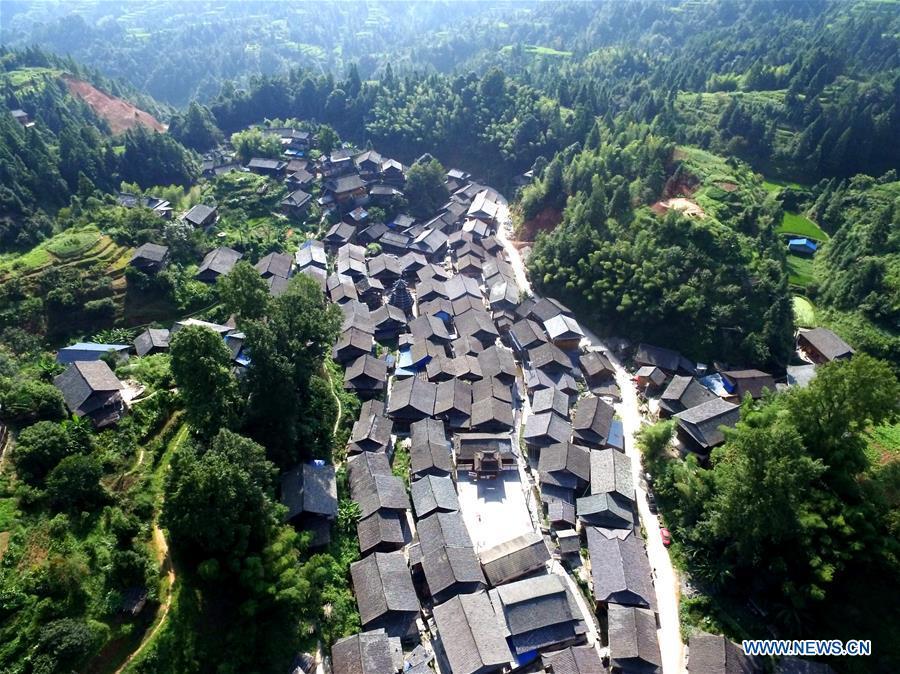 Photo taken on Aug. 14, 2018 shows the Zaidang village of Dong ethnic group, Qiandongnan of southwest China\'s Guizhou Province. Zaidang, a village of Dong ethnic group, has encouraged its villagers to make use of idle resources to upgrade local infrastructure, in an aim to develop tourism industry and shake off poverty. (Xinhua/Wang Bingzhen)