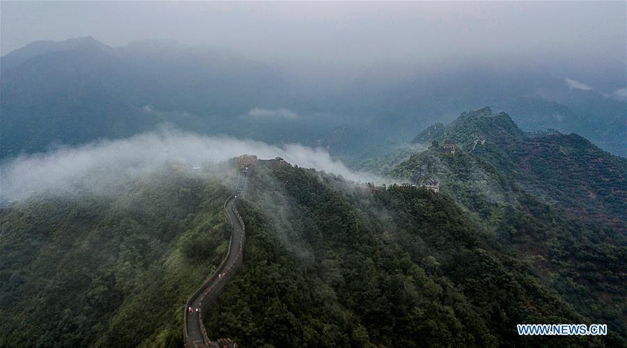 Photo taken on Aug. 13, 2018 shows cloud and fog after a rainfall at Huangyaguan section of the Great Wall in the Jizhou District of Tianjin, north China. (Xinhua/Wang Guangshan)
