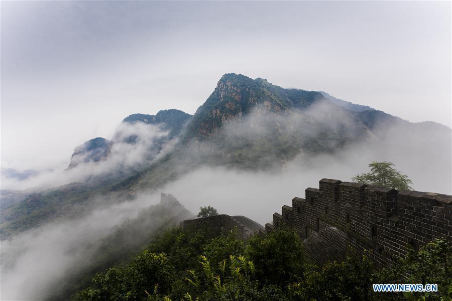Photo taken on Aug. 13, 2018 shows cloud and fog after a rainfall at Huangyaguan section of the Great Wall in the Jizhou District of Tianjin, north China. (Xinhua/Wang Guangshan)