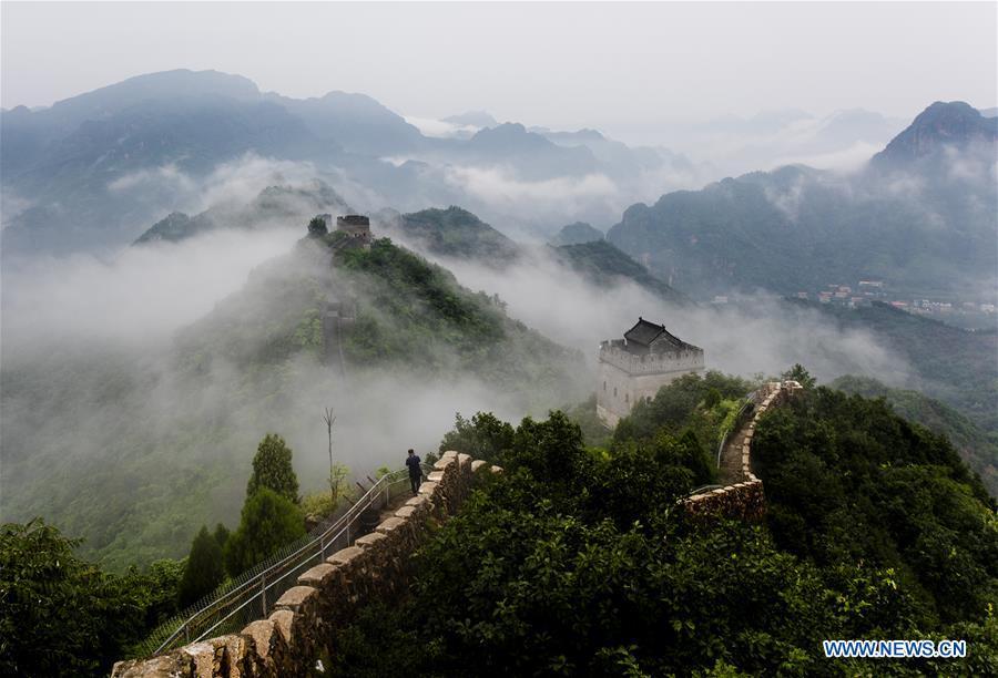 Photo taken on Aug. 13, 2018 shows cloud and fog after a rainfall at Huangyaguan section of the Great Wall in the Jizhou District of Tianjin, north China. (Xinhua/Wang Guangshan)