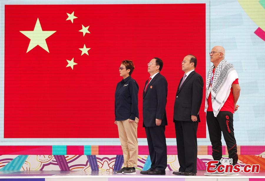 A flag-raising ceremony is held for Chinese athletes to the 18th Asian Games in Jakarta, Aug. 16, 2018. (Photo: China News Service/Liu Guanguan)