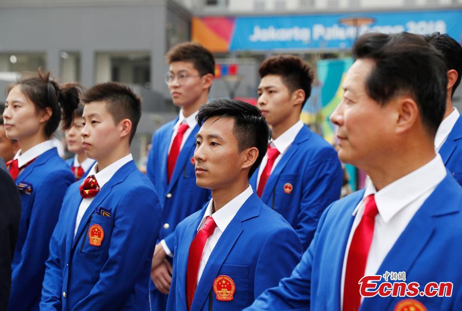 A flag-raising ceremony is held for Chinese athletes to the 18th Asian Games in Jakarta, Aug. 16, 2018. (Photo: China News Service/Liu Guanguan)
