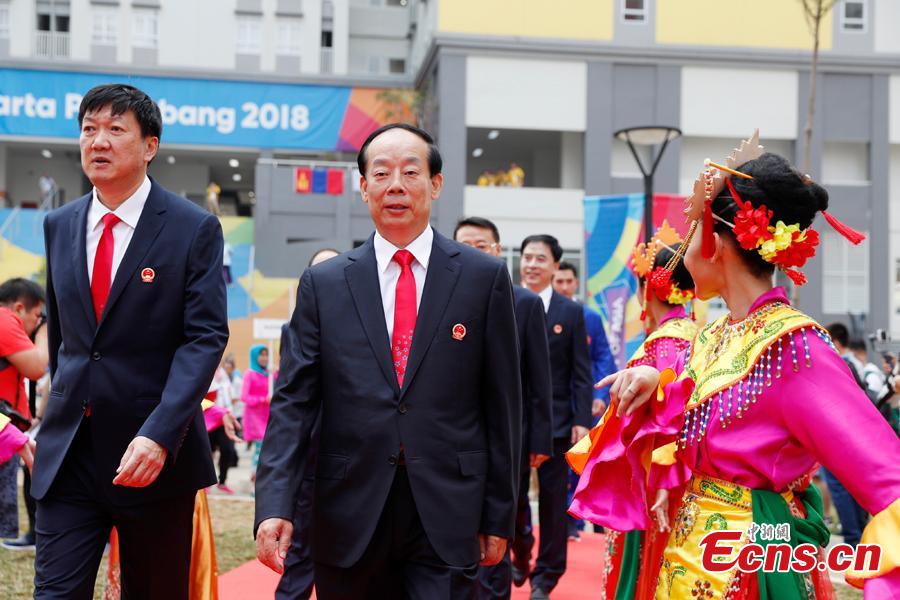 A flag-raising ceremony is held for Chinese athletes to the 18th Asian Games in Jakarta, Aug. 16, 2018. (Photo: China News Service/Liu Guanguan)