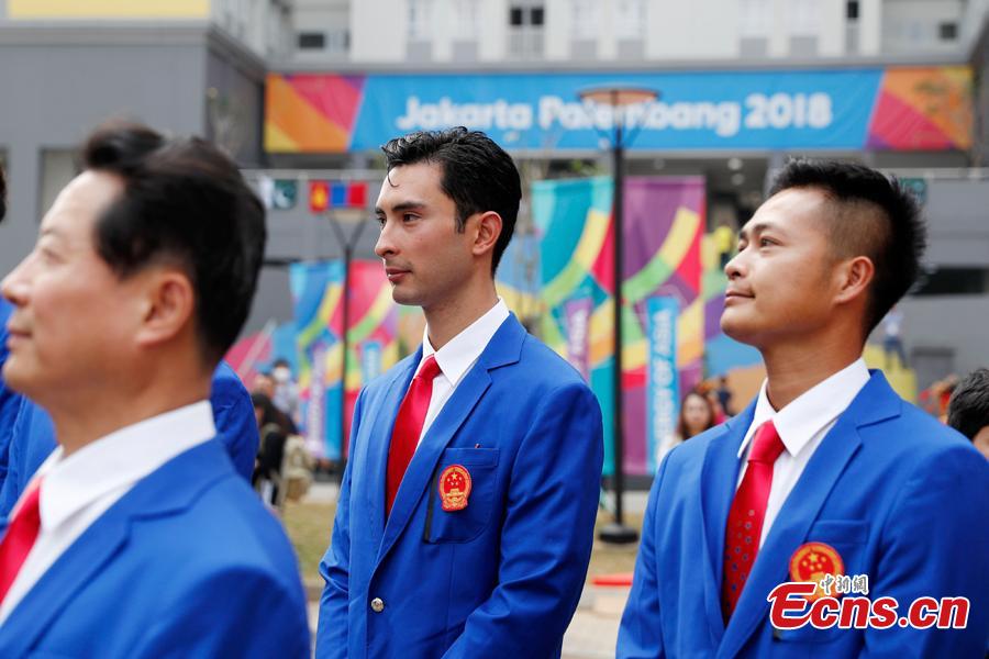 A flag-raising ceremony is held for Chinese athletes to the 18th Asian Games in Jakarta, Aug. 16, 2018. (Photo: China News Service/Liu Guanguan)