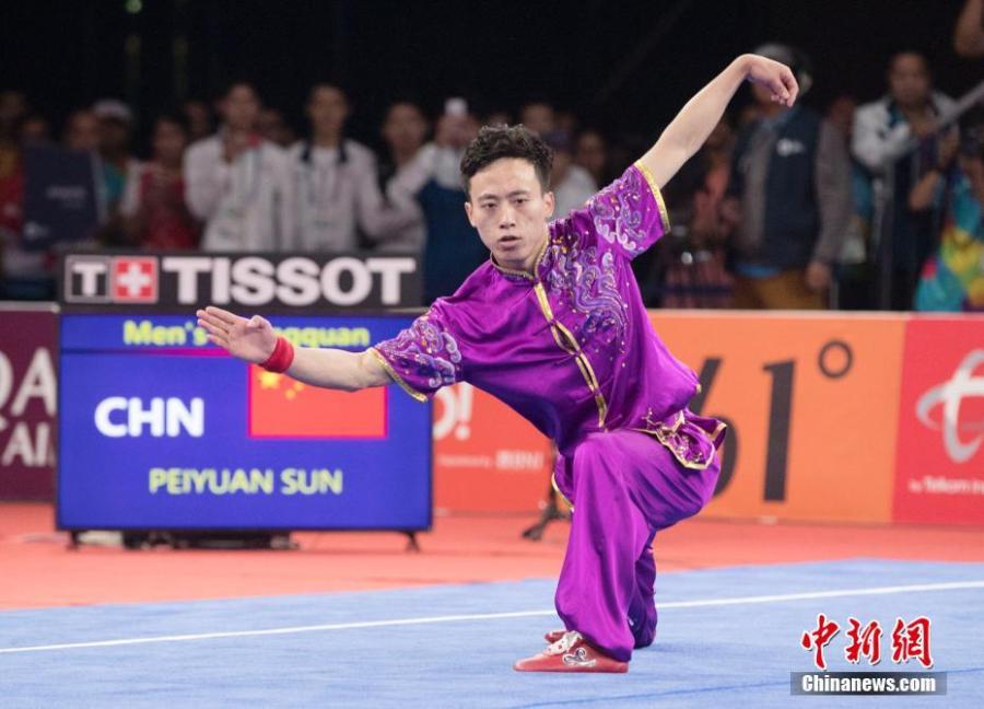Sun Peiyuan of China competes during the Men\'s Changquan final at the 18th Asian Games in Jakarta, Indonesia Aug. 19, 2018. (Photo/China News Service)