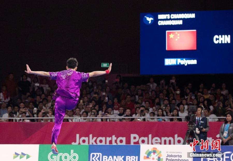 Sun Peiyuan of China competes during the Men\'s Changquan final at the 18th Asian Games in Jakarta, Indonesia Aug. 19, 2018. (Photo/China News Service)