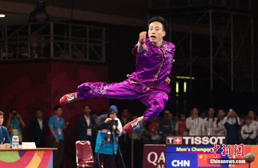 Sun Peiyuan of China competes during the Men\'s Changquan final at the 18th Asian Games in Jakarta, Indonesia Aug. 19, 2018. (Photo/China News Service)