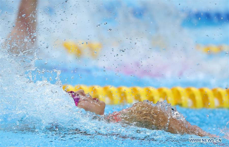 Liu Xiang of China competes during women\'s 50m backstroke final of swimming at the 18th Asian Games in Jakarta, Indonesia, Aug. 21, 2018. Liu won the gold with 26.98 seconds and set a new world record. (Xinhua/Fei Maohua)