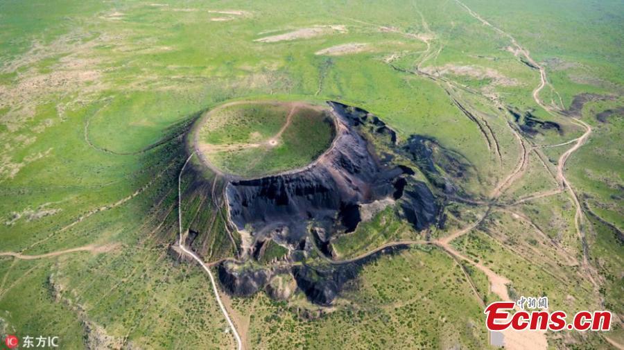 File photo of Ulan-hada Volcano Geopark in Chahar Right Rear Banner, North China’s Inner Mongolia Autonomous Region. The park, 380 kilometers from Beijing and known as a “museum” of natural volcanoes and lava landforms, has attracted an increasing number of tourists - at its most, 6,000 a day in 2018 - and local authorities are unable to cope with the strain these numbers place on the management of and environmental protection at the park. The park has recently closed. (Photo/IC)
