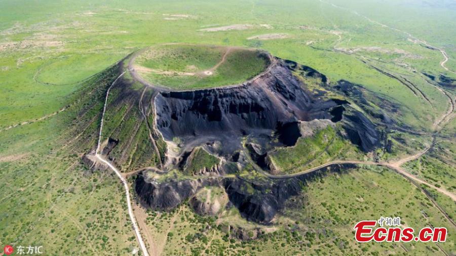 File photo of Ulan-hada Volcano Geopark in Chahar Right Rear Banner, North China’s Inner Mongolia Autonomous Region. The park, 380 kilometers from Beijing and known as a “museum” of natural volcanoes and lava landforms, has attracted an increasing number of tourists - at its most, 6,000 a day in 2018 - and local authorities are unable to cope with the strain these numbers place on the management of and environmental protection at the park. The park has recently closed. (Photo/IC)