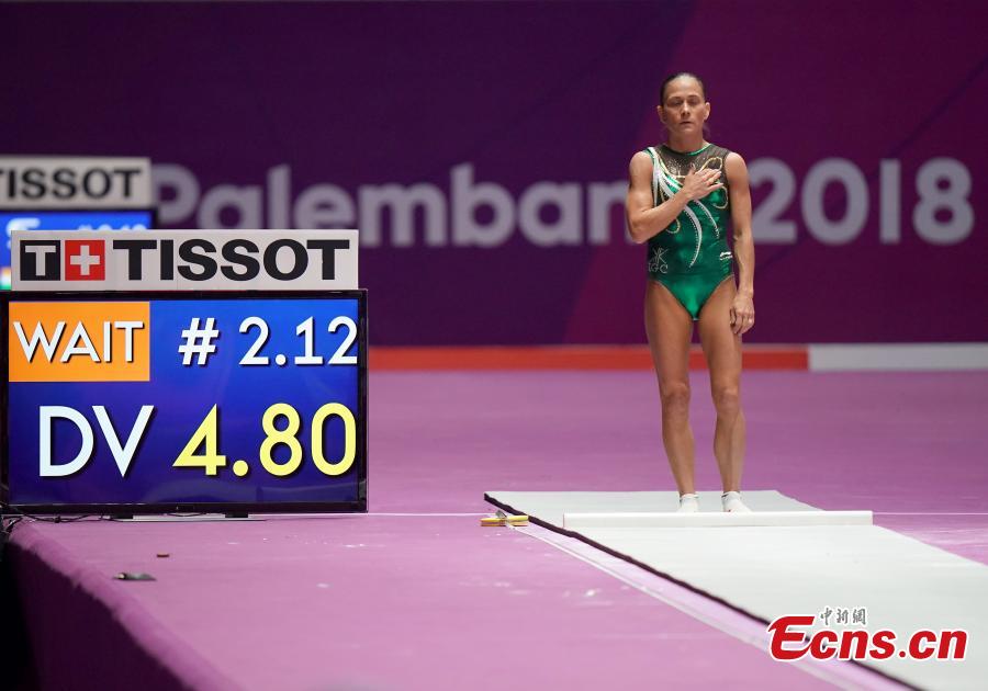 Uzbekistan\'s Oksana Chusovitina performs during the Artistic Gymnastics Women\'s Vault at the 2018 Asian Games in Jakarta, Indonesia, Aug.23, 2018. Chusovitina, 43 years old, won a silver medal in vault at the Asian Games. Chusovitina is a marvel of athletic longevity, with her international gymnastics career spanning nearly 30 years. (Photo: China News Service/Hou Yu)