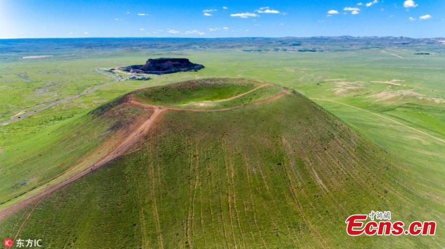File photo of Ulan-hada Volcano Geopark in Chahar Right Rear Banner, North China’s Inner Mongolia Autonomous Region. The park, 380 kilometers from Beijing and known as a “museum” of natural volcanoes and lava landforms, has attracted an increasing number of tourists - at its most, 6,000 a day in 2018 - and local authorities are unable to cope with the strain these numbers place on the management of and environmental protection at the park. The park has recently closed. (Photo/IC)