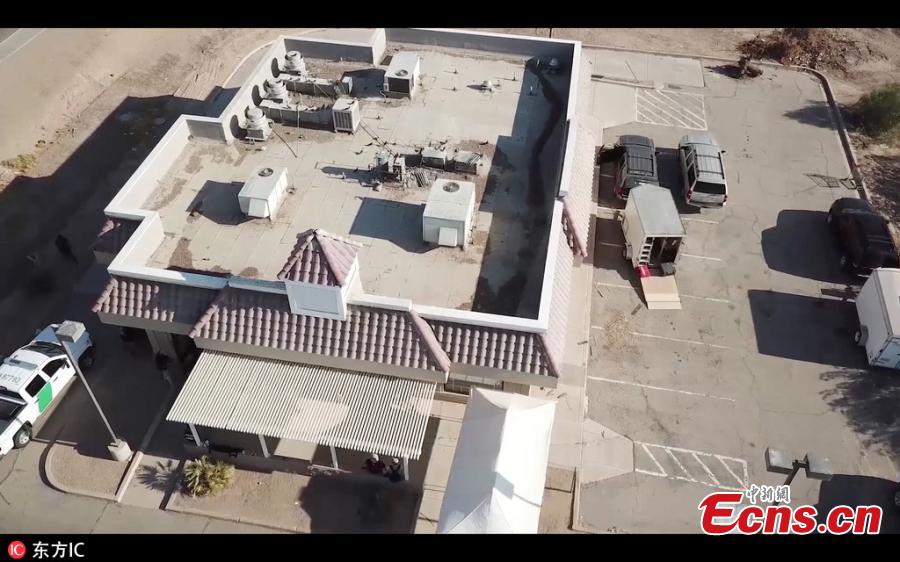 US authorities have found a secret drug tunnel stretching from a former KFC in the state of Arizona to Mexico. The building\'s owner was arrested after the 180m passageway was discovered in the basement of the old restaurant in San Luis, leading under the border to a home in San Luis Rio Colorado. (Photo/IC)