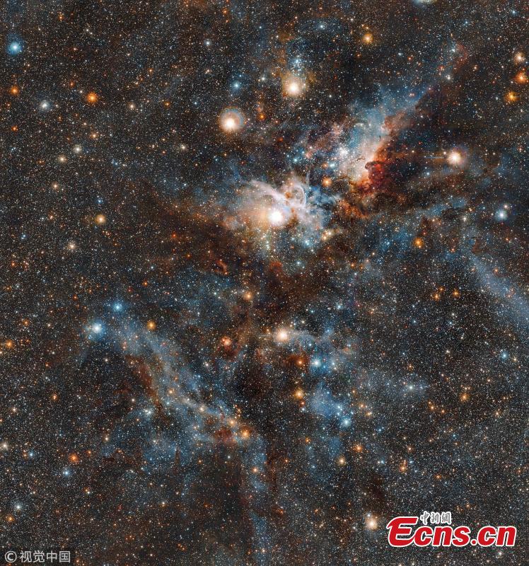 A handout photo made available by the European Southern Observatory (ESO) shows the Carina Nebula, taken by ESO\'s VISTA telescope at the Paranal Observatory in Chile. According to ESO, the image highlights the cloud of interstellar matter and thinly spread gas and dust. About 7500 light-years away, in the constellation of Carina, lies a nebula within which stars form and perish side-by-side. Shaped by these dramatic events, the Carina Nebula is a dynamic, evolving cloud of thinly spread interstellar gas and dust. (Photo/VCG)