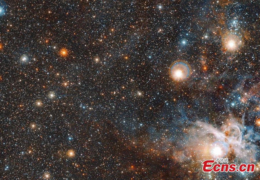 A handout photo made available by the European Southern Observatory (ESO) shows the Carina Nebula, taken by ESO\'s VISTA telescope at the Paranal Observatory in Chile. According to ESO, the image highlights the cloud of interstellar matter and thinly spread gas and dust. About 7500 light-years away, in the constellation of Carina, lies a nebula within which stars form and perish side-by-side. Shaped by these dramatic events, the Carina Nebula is a dynamic, evolving cloud of thinly spread interstellar gas and dust. (Photo/VCG)