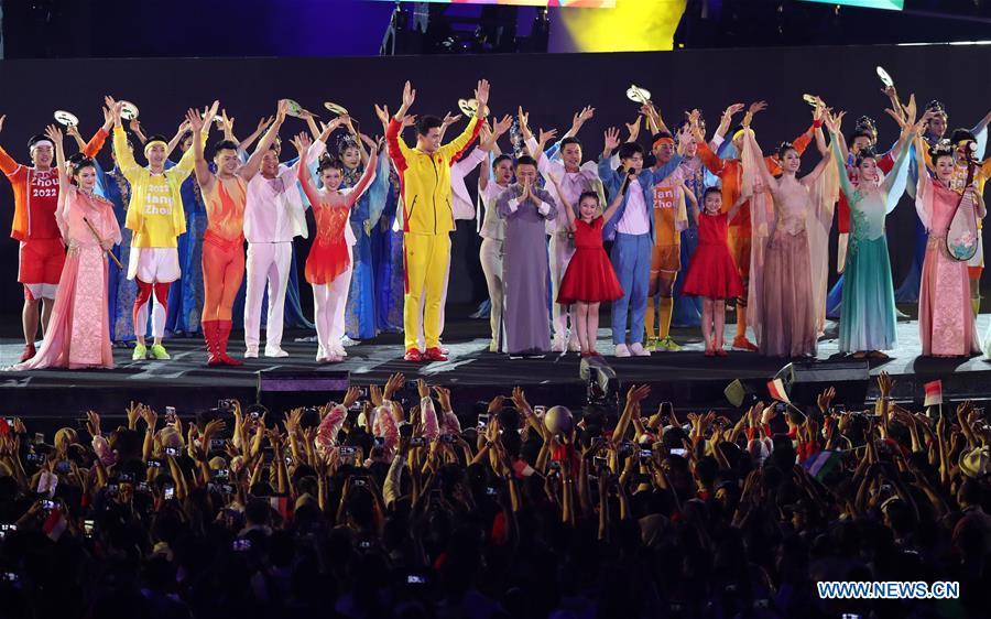 Chinese swimmer Sun Yang and Jack Ma, founder and chairman of Chinese e-commerce giant Alibaba Group, are seen at the Hangzhou 2022 presentation during the closing ceremony for the 18th Asian Games at the Gelora Bung Karno (GBK) Main Stadium in Jakarta, Indonesia.(Xinhua/Ding Ting)