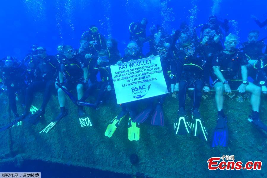 Ray Woolley, pioneer diver and World War 2 veteran, and other scuba divers pose for a photo at the Zenobia wreck, off the Cypriot town of Larnaca, Cyprus September 1, 2018. (Photo/Agencies)