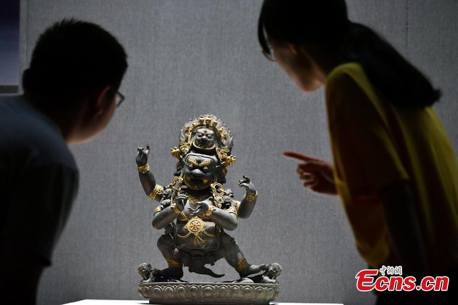 An exhibition of bronze Buddha statues opens in Shijiazhuang City, North China’s Hebei Province, Sept. 4, 2018. Hebei Provincial Museum displayed some 200 selected bronze Buddha statues made in the period from the Sixteen Kingdoms in the north (303?439) to the Qing Dynasty (1368-1644) to show the evolution of Buddhism and Buddha images in China. (Photo: China News Service/Zhai Yujia)
