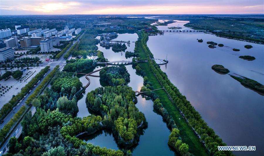 Aerial photo taken on Sept. 7, 2018 shows the scenery of a wetland park along the Heihe River in Gaotai County of Zhangye City, northwest China\'s Gansu Province. (Xinhua/Tao Ming)