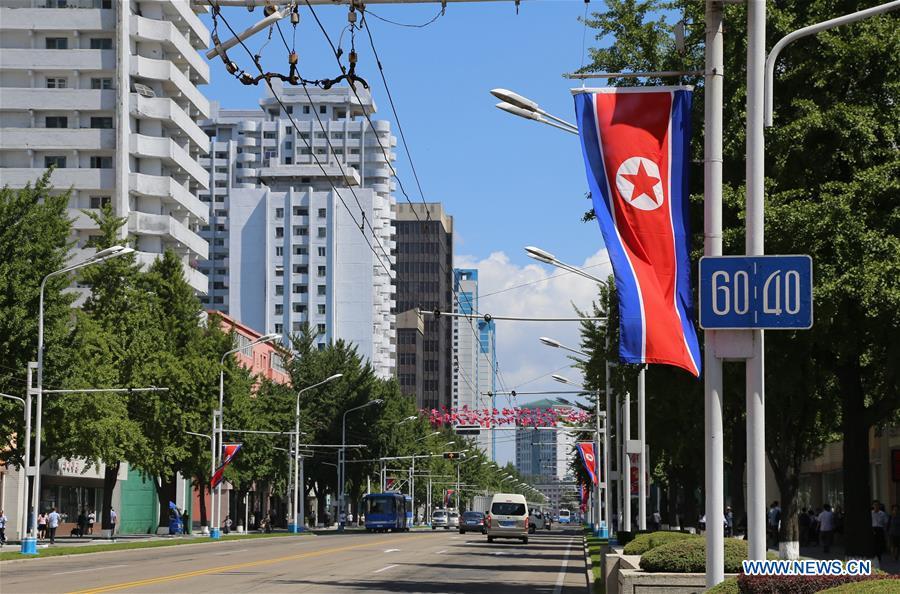 Photo taken on Sept. 8, 2018 shows an avenue decorated with national flags in Pyongyang, capital of the Democratic People\'s Republic of Korea (DPRK). Sept. 9, 2018 marks the 70th anniversary of the founding of the DPRK. (Xinhua/Jiang Yaping)