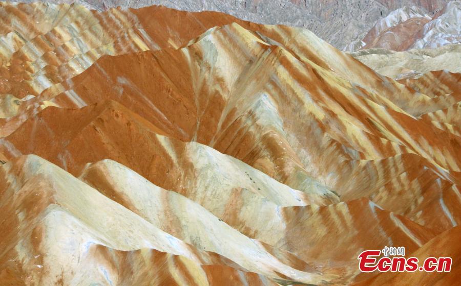 The colorful Danxia landform group, located in Zhangye City, Northwest China’s Gansu Province. At an average elevation of 1850 meters, the Danxia landform stretches east to west for 45 kilometers and north to south for 10 kilometers. More than a famous tourist attraction, the Danxia landform has been featured in a number of movies. (Photo: China News Service/Ren Haixia)