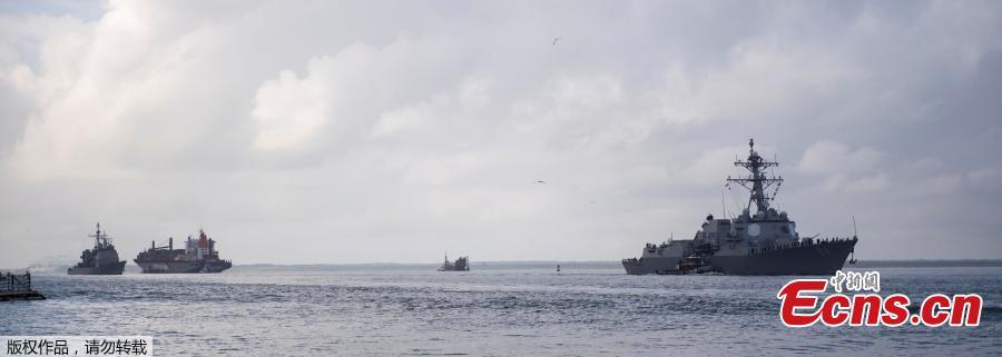 The guided-missile destroyer USS Nitze (DDG 94), front, and the guided-missile cruiser USS Leyte Gulf (CG 55) depart Naval Station Norfolk, Virginia, Sept. 10, 2018. There are nearly 30 ships preparing to get underway from Naval Station Norfolk and Joint Expeditionary Base Little Creek as Hurricane Florence is forecasted to bring high winds and rain to the Mid-Atlantic coast. Ships will be directed to areas of the Atlantic where they will be best postured for storm avoidance. (Photo/Agencies)