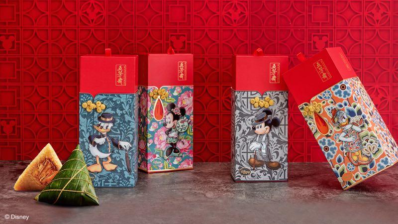 Boxes for zongzi, a Chinese rice treat, are decorated with images of, from left, Donald Duck, Minnie Mouse, Mickey Mouse, and Daisy Duck. (Photo provided to chinadaily.com.cn)