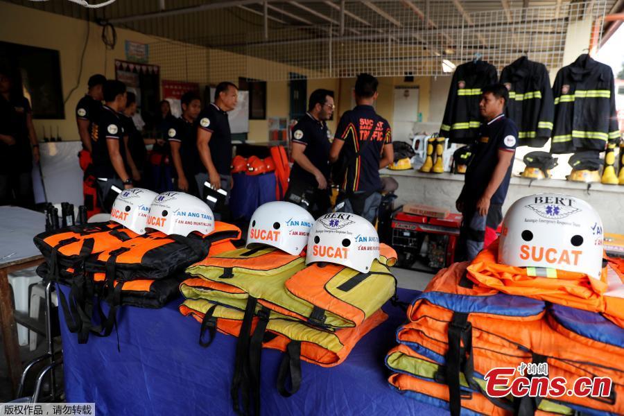 Rescuers ready their gear before Super Typhoon Mangkhut hits the main island of Luzon, in Muntinlupa, Metro Manila, in Philippines, Sept. 13, 2018. (Photo/Agencies)