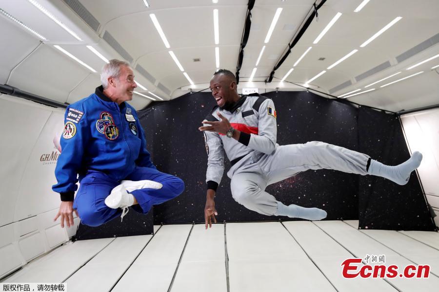 Sprinter Usain Bolt and French astronaut Jean-Francois Clervoy, CEO of Novespace, enjoy zero gravity conditions during a flight in a specially modified plane above Reims, France, Sept. 12, 2018. (Photo/Agencies)