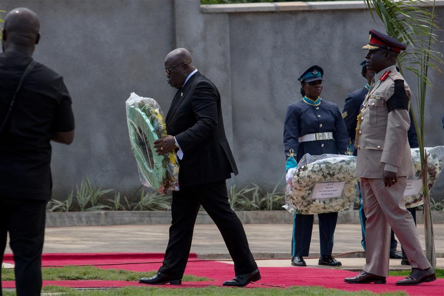 Ghanaian President Nana Akufo-Addo (2nd L) lays a wreath for former UN Secretary-General Kofi Annan during Annan\'s state funeral in Accra, Ghana, on Sept. 13, 2018. A number of African and world leaders joined Ghanaian President Nana Akufo-Addo here on Thursday to bid farewell to former United Nations Secretary-General Kofi Annan, who passed away in Switzerland on Aug. 18. (Xinhua/Fred Bonsu)