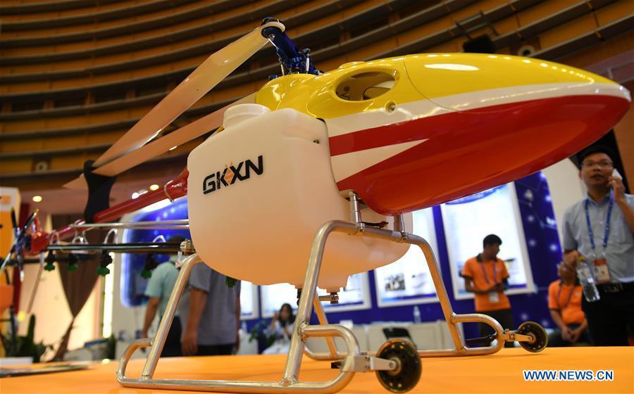 Photo taken on Sept. 13, 2018 shows a civilian drone at the 15th China-ASEAN Expo in Nanning City, south China\'s Guangxi Zhuang Autonomous Region. High-tech exhibits attracted many visitors at the expo. (Xinhua/Zhang Ailin)