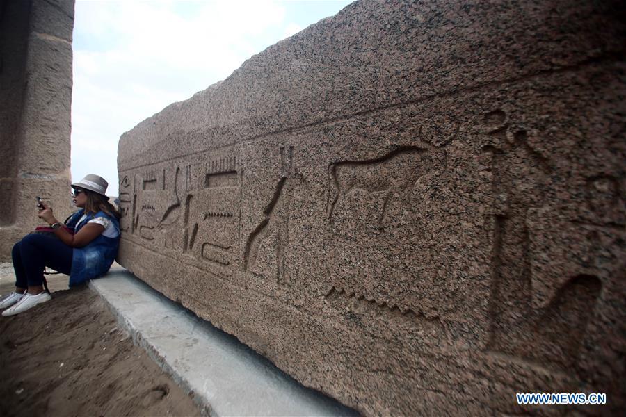A woman rests in an open-air museum in Sharqiya, Egypt, on Sept. 15, 2018. Some 130 kilometers away from the Egyptian capital Cairo, work continued to revive the north capital of ancient Egypt, San al-Hagar or Tanis and to turn it into an open-air museum. (Xinhua/Ahmed Gomaa)
