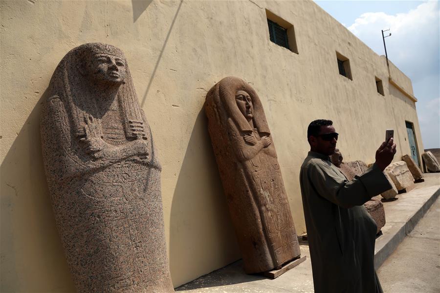 A man takes selfies in an open-air museum in Sharqiya, Egypt, on Sept. 15, 2018. Some 130 kilometers away from the Egyptian capital Cairo, work continued to revive the north capital of ancient Egypt, San al-Hagar or Tanis and to turn it into an open-air museum. TO GO WITH Feature: Egypt to turn Tanis archaeological site into open-air museum (Xinhua/Ahmed Gomaa)