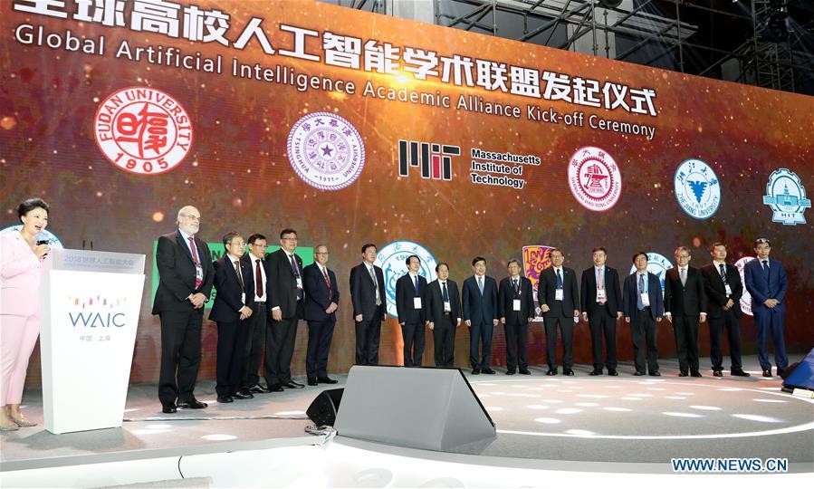Guests attend a global artificial intelligence academic alliance kick-off ceremony during the World Artificial Intelligence Conference (WAIC) 2018 in Shanghai, east China, Sept. 17, 2018. The three-day conference has attracted experts, scholars and entrepreneurs from nearly 40 countries and regions. More than 200 leading companies in AI participated in the conference and the exhibition. (Xinhua/Fang Zhe)