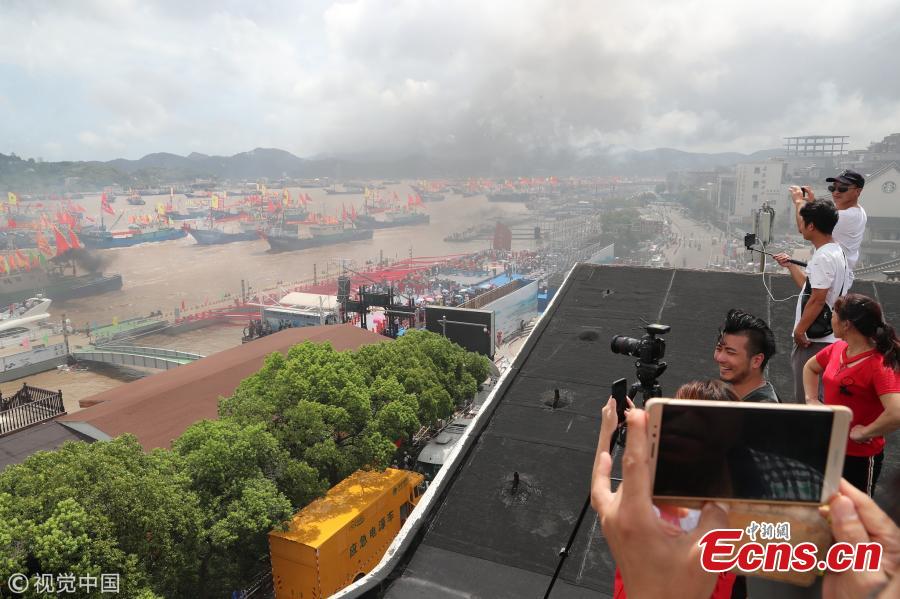 Fishing boats sail in the sea area of Ningbo, East China\'s Zhejiang Province, Sept. 16, 2018. A fishing ban, imposed on the Yellow Sea and the East China Sea from May 1 to Sept. 16, was lifted on Sunday. (Photo/VCG)