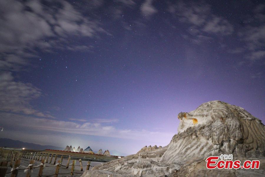 A sculpture near the Chaka Lake under a starry sky. “Chaka” means “salt lake” in Tibetan. Chaka Salt Lake is located near Chaka township in Wulan county in the east of the Qaidam Basin of Northwest China’s Qinghai Province. By day, the azure sky and floating clouds as well as mountains in the distance are reflected in the lake, creating a mirror of the sky in China. A starry night-themed photography festival, organized by the China News Service and the China Media Culture Promotion Association as well as other organizations, took place in the Chaka Lake scenic area. The lake area has been announced by a committee as the best venue in the country to take photos of the night sky. (Photo: China News Service/Wang Junfeng)