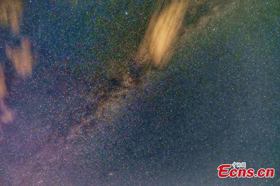 A view of the galaxy over the Chaka Lake. “Chaka” means “salt lake” in Tibetan. Chaka Salt Lake is located near Chaka township in Wulan county in the east of the Qaidam Basin of Northwest China’s Qinghai Province. By day, the azure sky and floating clouds as well as mountains in the distance are reflected in the lake, creating a mirror of the sky in China. A starry night-themed photography festival, organized by the China News Service and the China Media Culture Promotion Association as well as other organizations, took place in the Chaka Lake scenic area. The lake area has been announced by a committee as the best venue in the country to take photos of the night sky. (Photo: China News Service/Jia Juan)