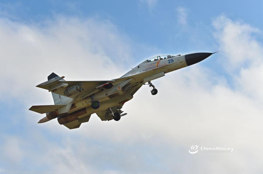 A J-11B fighter jet attached to an aviation brigade of the South China Sea Fleet under the PLA Navy takes off for a sortie during a live-fire flight training exercise near the South China Sea on September 19, 2018. (Photo/eng.chinamil.com.cn)