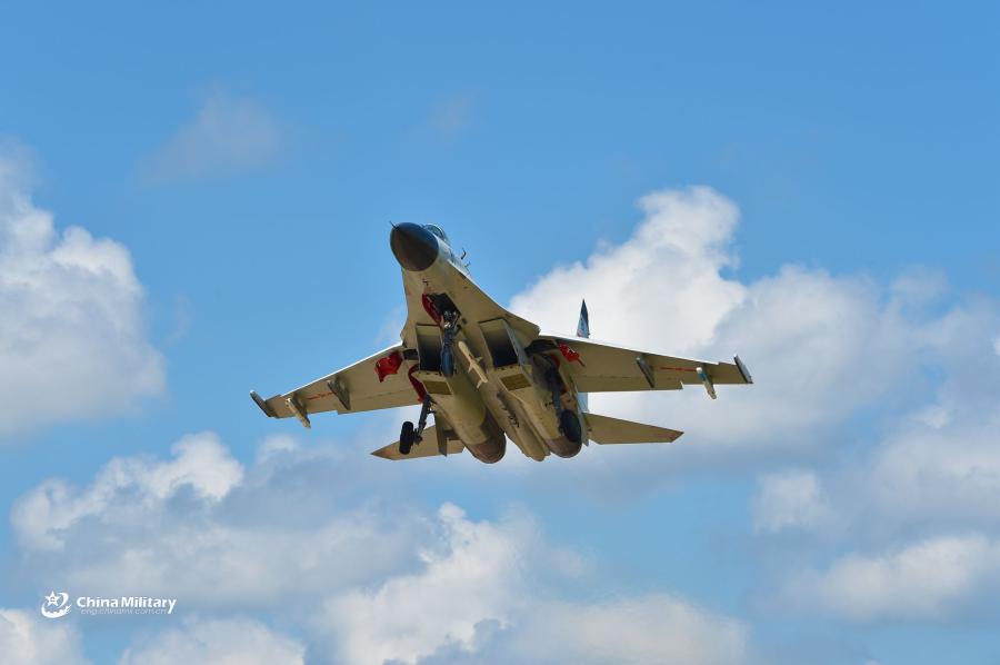 A J-11B fighter jet attached to an aviation brigade of the South China Sea Fleet under the PLA Navy takes off for a sortie during a live-fire flight training exercise near the South China Sea on September 19, 2018. (Photo/eng.chinamil.com.cn)