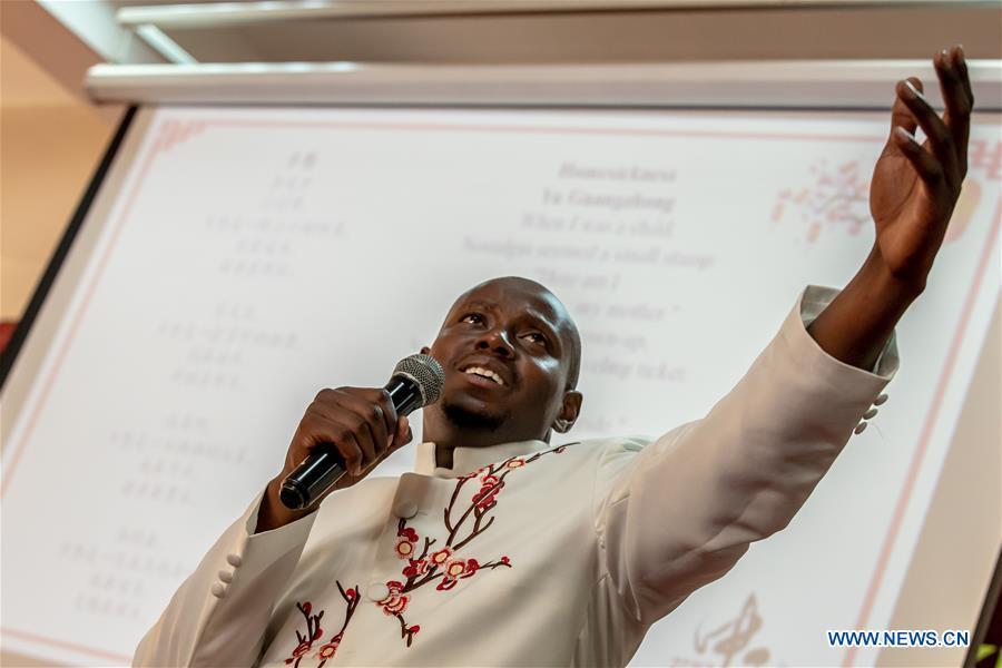 A student of the Confucius Institute of Kenyatta University recites poem at Kenyatta University in Nairobi, Kenya, on Sept. 21, 2018. The Confucius Institute of University of Nairobi and the Confucius Institute of Kenyatta University held celebrations respectively on Friday to mark the upcoming Mid-Autumn Festival, which falls on Sept. 24 this year. (Xinhua/Zhang Yu)