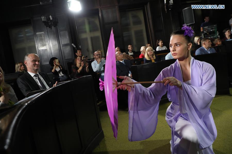 A student of the Confucius Institute of Banja Luka University dances in Chinese traditional costumes in Banja Luka, Bosnia and Herzegovina, on Sept. 22, 2018. The Confucius Institute of Banja Luka University organized a series of interactive workshops on the occasion of the Day of Confucius Institutes through a diverse program of activities in promoting Chinese culture here on Saturday. (Xinhua/Haris Memija)