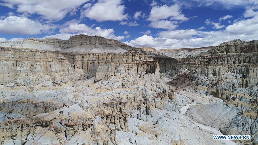 Aerial photo taken on Sept. 11, 2018 shows the scenery of earth forest in Zanda County of Ngari, southwest China\'s Tibet Autonomous Region. The earth forest is the sediment stratum of rivers and lakes in ancient times, formed by erosion of water. The Ngari area has an average altitude of more than 4,000 metres. (Xinhua/Purbu Zhaxi)