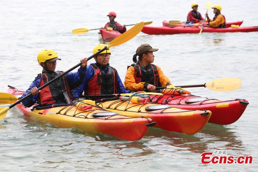 Servicewomen from China and Australia during a joint military training exercise called Exercise Pandaroo 2018 in Sydney, Australia, Sept. 26, 2018. Ten members from each of the two countries\' armies participated in the training. (Photo: China News Service/Tao Shelan)