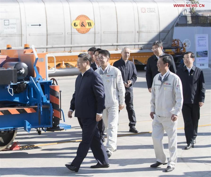 Chinese President Xi Jinping, also general secretary of the Communist Party of China (CPC) Central Committee and chairman of the Central Military Commission, visits China Railway Rolling Stock Corporation (CRRC) Qiqihar Co. in Qiqihar, northeast China\'s Heilongjiang Province, Sept. 26, 2018. Xi inspected Qiqihar on Wednesday. (Xinhua/Wang Ye)