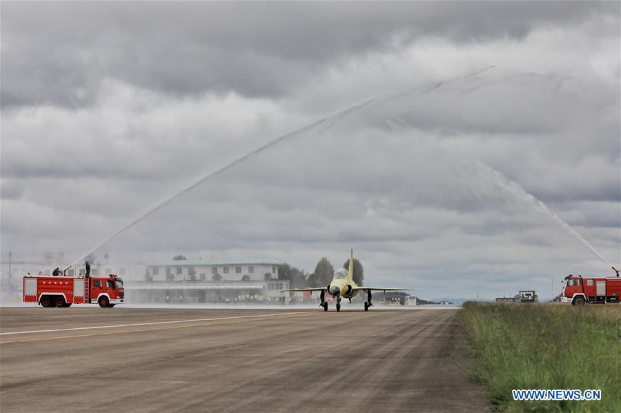 Photo taken on Sept. 28, 2018 shows the FTC-2000G aircraft taxiing on the runway in Anshun, southwest China\'s Guizhou Province. China\'s self-developed FTC-2000G versatile aircraft successfully conducted its maiden flight Friday in the city of Anshun, according to its developer. (Xinhua/Ou Dongqu)