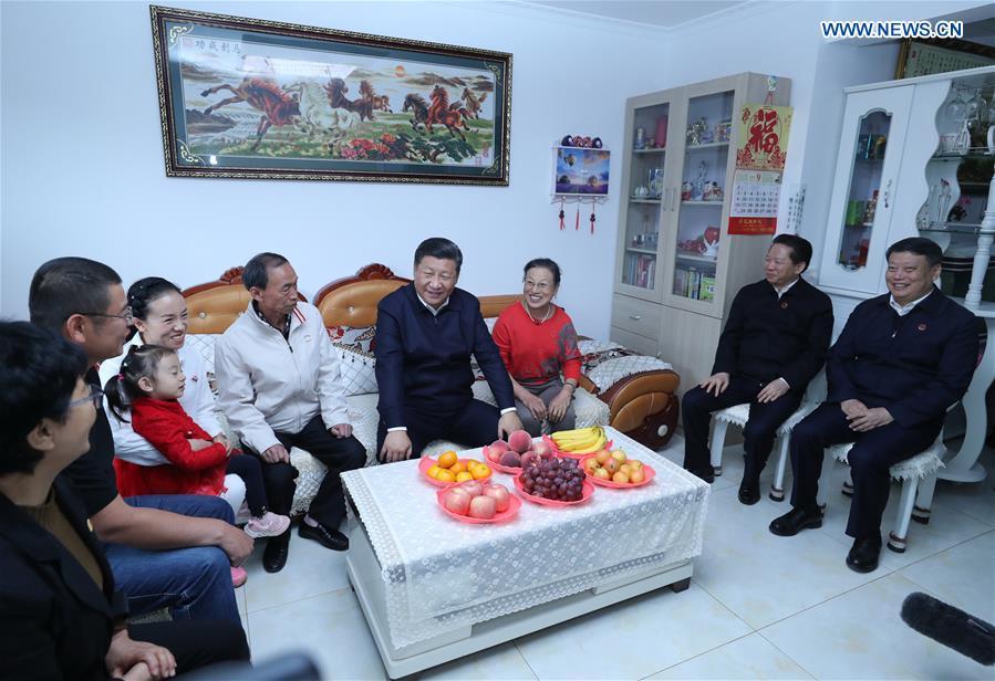 Chinese President Xi Jinping, also general secretary of the Communist Party of China (CPC) Central Committee and chairman of the Central Military Commission, visits Donghuayuan, a resettlement community for residents from coal-mining area in Fushun, northeast China\'s Liaoning Province, Sept. 28, 2018. (Xinhua/Ju Peng)
