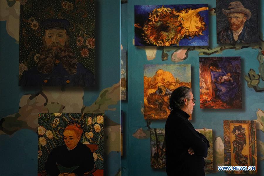 A visitor looks at exhibits at the \
