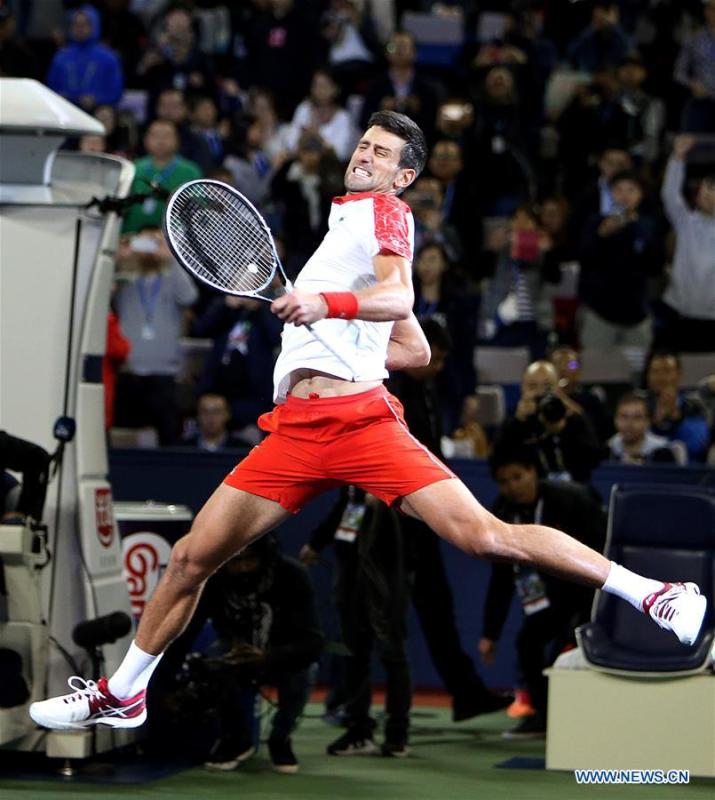 Novak Djokovic of Serbia celebrates after winning the men\'s singles final match against Borna Coric of Croatia at 2018 ATP Shanghai Masters tennis tournament in Shanghai, east China, Oct. 14, 2018. Novak Djokovic won 2-0 in the final and claimed the title of the event. (Xinhua/Fan Jun)