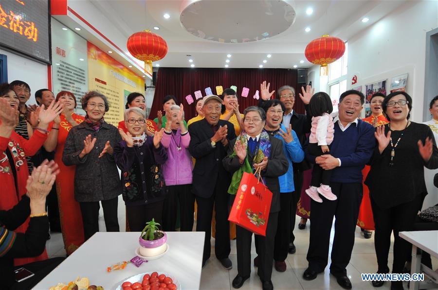 Residents celebrate in Hetaoyuan community of Xicheng District in Beijing, capital of China, Oct. 16, 2018. Senior residents in the community got together to watch a performance celebrating the upcoming Chongyang Festival, a day to pay respect to seniors that falls on the ninth day of the ninth lunar month, which is on Oct. 17 this year. (Xinhua/Zhao Yusi)