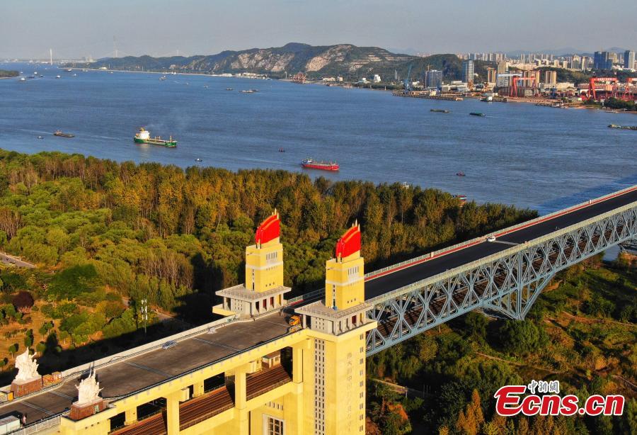 A drone photo shows the Nanjing Yangtze River Bridge, which is undergoing renovation work, in Nanjing City, Jiangsu Province, Oct. 18, 2018. A double-decked road-rail truss bridge across the Yangtze River, it was completed and open for traffic in 1968 and remains one of the most famous landmarks in China. The bridge is set to reopen by the end of the year. (Photo: China News Service/Yang Bo)